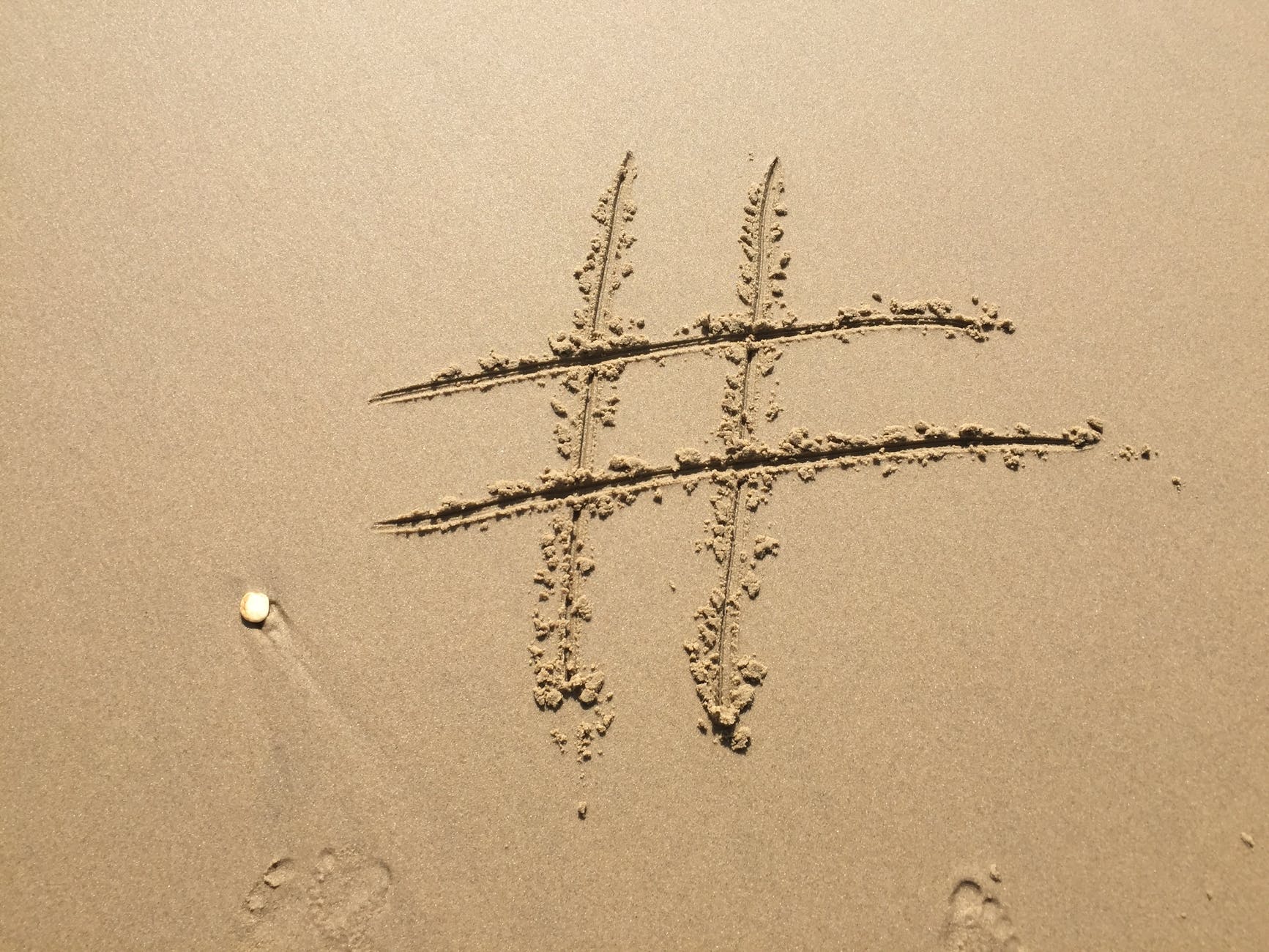 beach footprint hashtag island